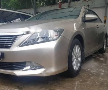 Toyota Camry  2.0E   2014 - Bán Camry 2.0E số tự động, năm, màu nâu vàng, xe chạy 40.000km