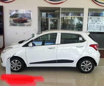 Hyundai Grand i10  1.2 2015 - Cần bán Hyundai Grand i10 năm 2015, màu trắng, số tự động