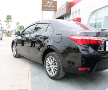 Toyota Corolla altis 1.8 G 2015 - Bán Toyota Corolla altis 1.8 G sản xuất 2015, màu đen