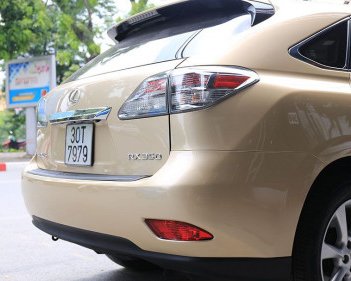 Lexus RX 350  3.5 AT  2009 - Bán Lexus RX 350  3.5 AT sản xuất năm 2009, màu vàng