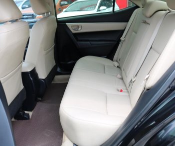 Toyota Corolla altis 1.8 G 2015 - Bán Toyota Corolla altis 1.8 G sản xuất 2015, màu đen