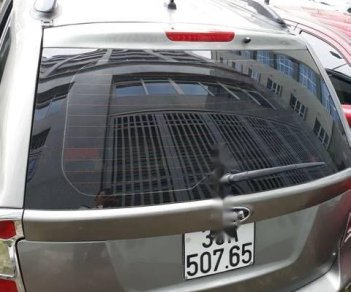 Kia Carens   2010 - Bán Kia Carens sản xuất năm 2010, màu bạc số sàn