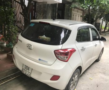 Hyundai Grand i10 2015 - Bán ô tô Hyundai Grand i10 1.0 MT, bản đủ, SX năm 2015, màu trắng, xe nhập, 425 triệu