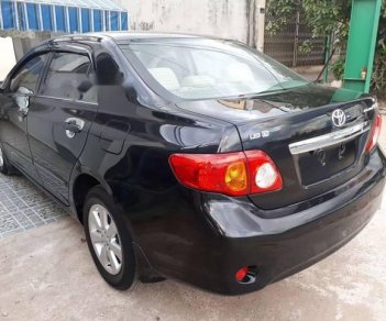 Toyota Corolla altis  AT 2009 - Cần bán gấp Toyota Corolla Altis AT đời 2009, màu đen, nhập khẩu   