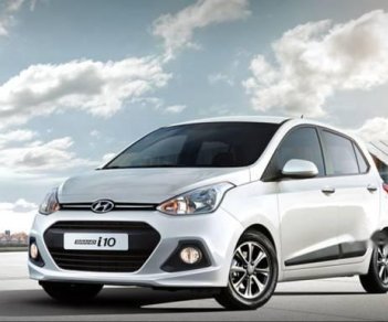 Hyundai Grand i10  1.2 2015 - Cần bán Hyundai Grand i10 năm 2015, màu trắng, số tự động