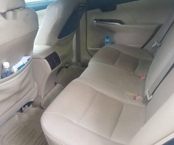 Toyota Camry  2.0E   2014 - Bán Camry 2.0E số tự động, năm, màu nâu vàng, xe chạy 40.000km