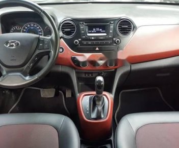 Hyundai Grand i10   1.2AT 2014 - Bán Hyundai Grand i10 bản 1.2 AT, sản xuất 2014, chạy rất ít, mới chỉ đi 1 vạn 4