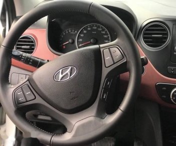 Hyundai Grand i10  1.2 2016 - Bán Hyundai Grand i10 năm sản xuất 2016, màu trắng số tự động