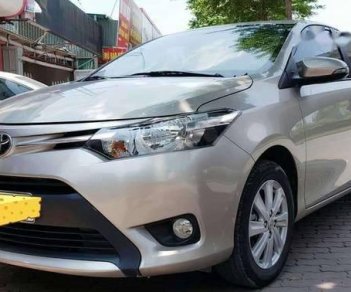 Toyota Vios  E 2017 - Bán Toyota Vios E đời 2017, màu vàng cát