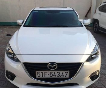 Mazda 3   2015 - Cần bán gấp Mazda 3 sản xuất 2015, màu trắng ít sử dụng, 600 triệu