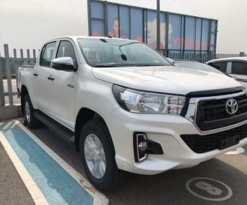 Toyota Hilux 2.4G MT 2018 - Bán Toyota Hilux 2.4G MT 2018, màu trắng, nhập khẩu nguyên chiếc, giao xe sớm alo 0986924166