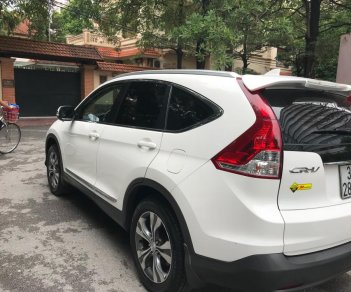 Honda CR V 2.4 at 2014 - Em bán xe Honda CR-V 2.4 AT sx 2014 màu trắng tư nhân chính chủ, xe sơn zin 95%, lốp 5 quả theo xe