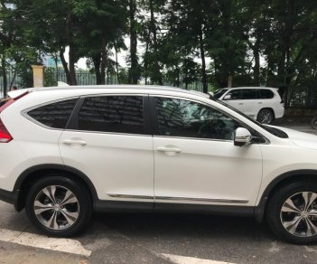 Honda CR V 2.4 at 2014 - Em bán xe Honda CR-V 2.4 AT sx 2014 màu trắng tư nhân chính chủ, xe sơn zin 95%, lốp 5 quả theo xe