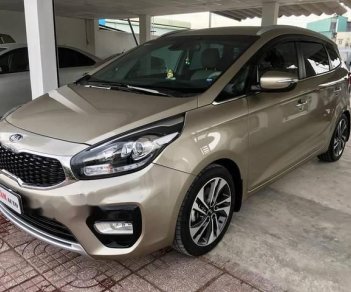 Kia Rondo  GAT  2017 - Cần bán xe Kia Rondo GAT 2017, màu vàng