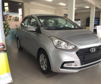 Hyundai Grand i10  1.2 MT 2018 - Cần bán Hyundai Grand i10 1.2 MT năm 2018, màu bạc, giá tốt