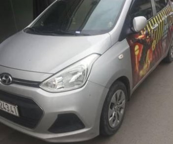 Hyundai Grand i10 2016 - Cần bán gấp Hyundai Grand i10 sản xuất năm 2016, màu bạc giá cạnh tranh