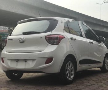 Hyundai Grand i10  1.2 2016 - Bán Hyundai Grand i10 năm sản xuất 2016, màu trắng số tự động