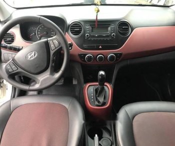 Hyundai Grand i10  1.2 2016 - Bán Hyundai Grand i10 năm sản xuất 2016, màu trắng số tự động