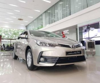 Toyota Corolla altis E CVT 2018 - Bán Toyota Corolla altis E CVT 2018, màu bạc