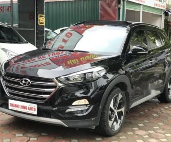 Hyundai Tucson 1.6 Turbo  2016 - Bán Hyundai Tucson 1.6 Turbo năm 2016, màu đen, giá 940tr