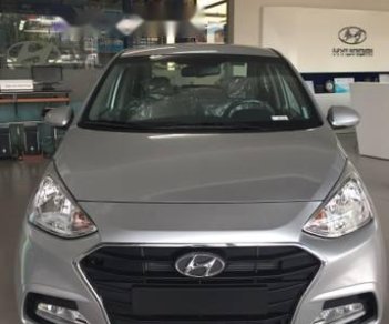 Hyundai Grand i10  1.2 MT 2018 - Cần bán Hyundai Grand i10 1.2 MT năm 2018, màu bạc, giá tốt