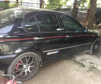 BMW 3 Series   2004 - Cần bán xe BMW 3 Series 2004, màu đen, xe gia đình