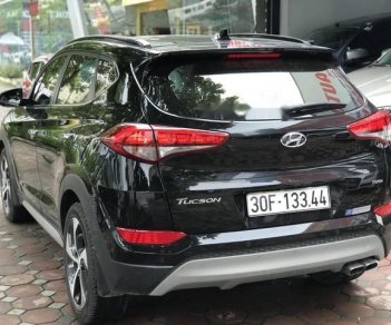 Hyundai Tucson 1.6 Turbo  2016 - Bán Hyundai Tucson 1.6 Turbo năm 2016, màu đen, giá 940tr