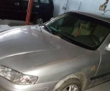 Mazda 626 2001 - Cần bán xe Mazda 626 sản xuất năm 2001, màu bạc, xe nhập, giá 195tr