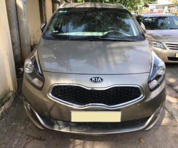 Kia Rondo GAT 2016 - Bán xe Kia Rondo 2016 số auto, màu vàng cát, odo 27.000 km đúng chất