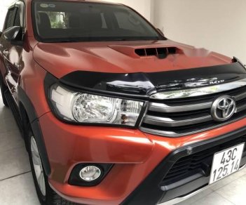 Toyota Hilux   2016 - Cần bán Toyota Hilux đời 2016, màu đỏ xe gia đình, giá 605tr