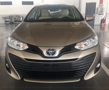 Toyota Vios 1.5E CVT 2018 - Bán xe Toyota Vios 1.5E CVT màu nâu, tăng gói bảo dưỡng 20.000km, hỗ trợ trả góp 90% giá xe. LH: 0912493498