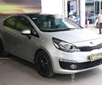 Kia Rio 1.4MT 2015 - Cần bán gấp Kia Rio 1.4MT sản xuất 2015, màu bạc