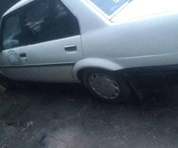 Toyota Corolla 1.3 1986 - Cần bán Toyota Corolla 1.3 đời 1986, màu trắng giá cạnh tranh