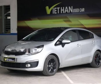 Kia Rio 1.4MT 2015 - Cần bán gấp Kia Rio 1.4MT sản xuất 2015, màu bạc