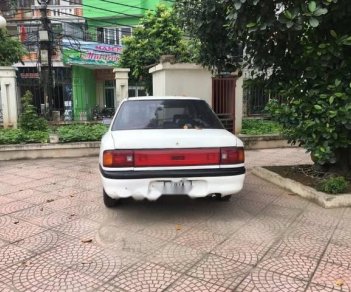 Mazda 323 1996 - Bán xe Mazda 323 đời 1996, màu trắng, giá chỉ 55 triệu