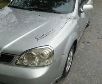 Chevrolet Lacetti  SE 2005 - Chính chủ bán Chevrolet Lacetti SE đời 2005, màu bạc