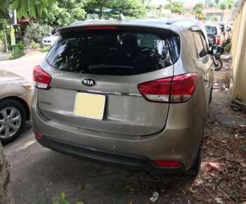 Kia Rondo GAT 2016 - Bán xe Kia Rondo 2016 số auto, màu vàng cát, odo 27.000 km đúng chất