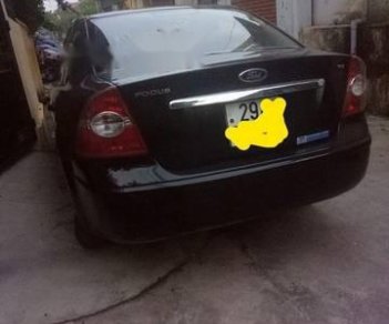 Ford Focus 1.8 2009 - Cần bán Ford Focus 1.8 đời 2009, màu đen giá cạnh tranh