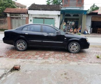 Daewoo Magnus 2005 - Cần bán gấp Daewoo Magnus năm sản xuất 2005, màu đen 