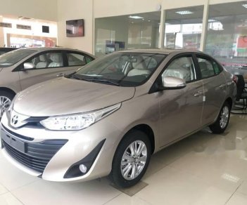 Toyota Vios 1.5 E CVT  2018 - Bán xe Toyota Vios 1.5 E CVT năm 2018, màu vàng