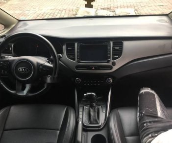 Kia Rondo 1.7AT 2015 - Bán Kia Rondo 1.7AT năm sản xuất 2015, màu vàng cát biển TP