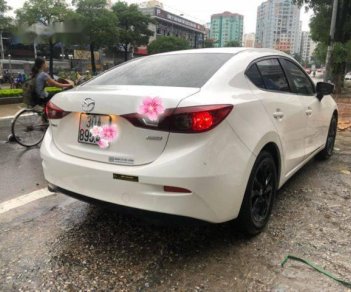 Mazda 3 1.5AT 2015 - Cần bán lại xe Mazda 3 1.5AT 2015, màu trắng chính chủ, giá chỉ 595 triệu