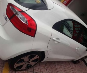 Kia Rio  AT 2013 - Bán chiếc Kia Rio Hatchback 5 cửa, màu trắng, đăng ký lần đầu 04/2013