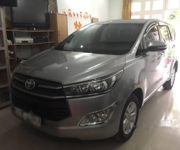 Toyota Innova  E    2016 - Gia đình cần bán xe Innova E 2017 số tay, màu bạc