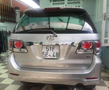 Toyota Fortuner MT 2016 - Cần tiền bán gấp Toyota Fortuner 8 chỗ, màu bạc, máy dầu