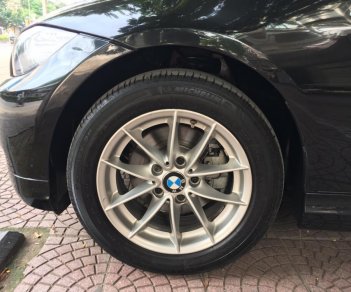 BMW 3 Series 320i 2011 - Cần bán xe BMW 320i sản xuất 2011 màu đen, xe nhập Đức cực đẹp