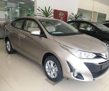 Toyota Vios 1.5 E CVT  2018 - Bán xe Toyota Vios 1.5 E CVT năm 2018, màu vàng