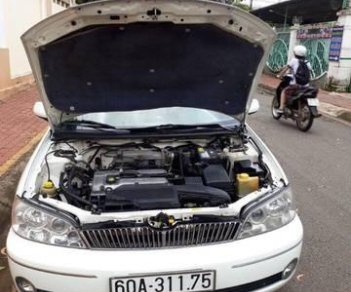 Ford Laser Deluxe 1.6 MT  2002 - Bán Ford Laser Deluxe 1.6 MT sản xuất 2002, màu trắng chính chủ