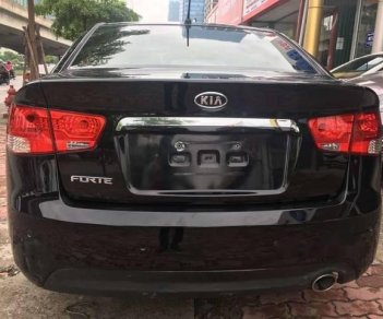 Kia Forte 2010 - Bán ô tô Kia Forte sản xuất 2010, màu đen chính chủ  