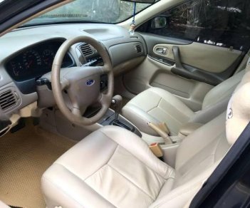 Ford Laser 2004 - Bán Ford Laser sản xuất năm 2004, màu đen 